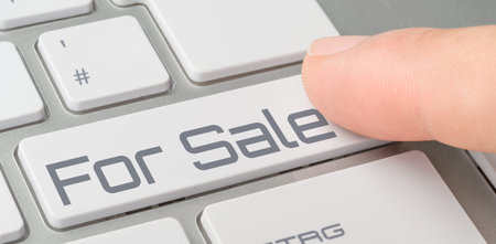 A keyboard with a labelled button - For Saleの写真素材