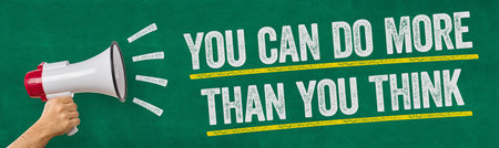 A man holding a megaphone - You can do more than you thinkの写真素材