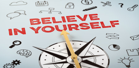 A compass with icons - Believe in yourselfの写真素材