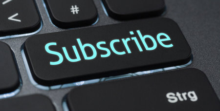 Illuminated keyboard with a labeled key - Subscribeの写真素材