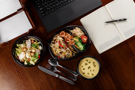 Business lunch on the desktop of your computerの写真素材