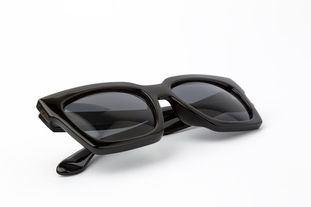 black sunglasses on white backgroundの写真素材
