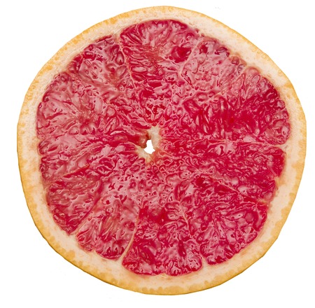 slice of grapefruit isolated on white background with clipping path.の写真素材