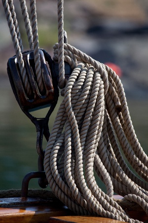 Old wooden block with rope. の写真素材
