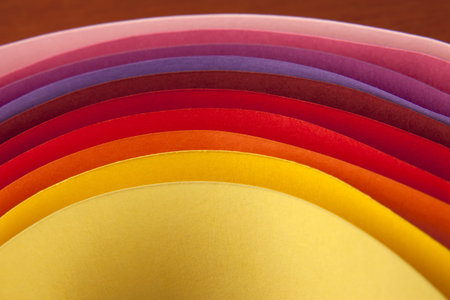 Colorful paper card stock abstract in elliptical shapes. 