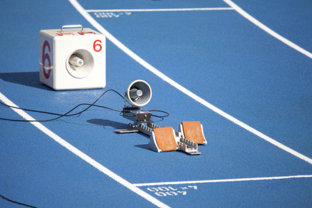 Start block of sprinters and loudspeaker 