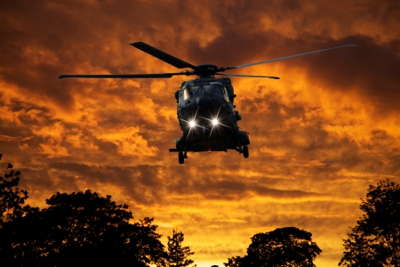 Helicopter at sunset の写真素材
