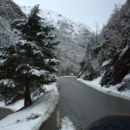 snowy mountain roadの写真素材