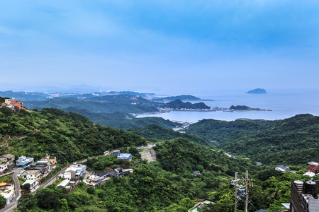 Panoramic aerial View of Jiufen with Keelung port and Sea from jiufen old streetの写真素材