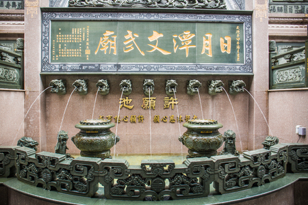 Nantou County, Taiwan - May 11, 2018: A wishing well fountain at Wenwu Templeのeditorial素材