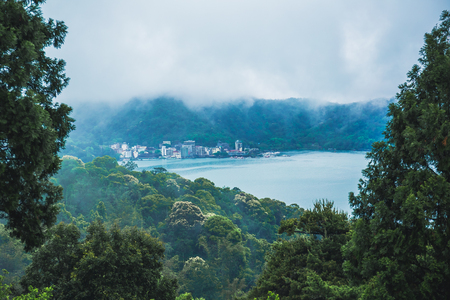 A magnificent scenery of Sun Moon Lake from the WenWu temple, Nantou, Taiwan.の写真素材