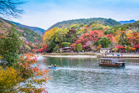 Kyoto, Japan - November 23, 2018: Arashiyama and Katsura river is the famous destination for tourist in autumn of japan. Many tourists come to see the beautiful autumn colors near the river.のeditorial素材
