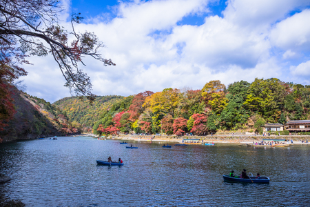 Kyoto, Japan - November 23, 2018: Arashiyama and Katsura river is the famous destination for tourist in autumn of japan. Many tourists come to see the beautiful autumn colors near the river.のeditorial素材