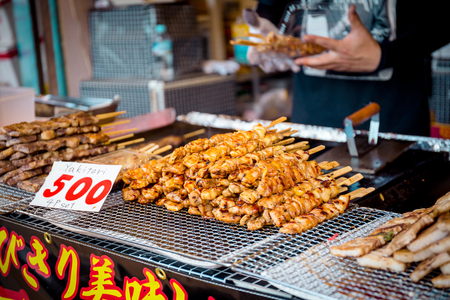 A Japanese type of skewered chicken selling at Arashiyama food stall with 500 Yen for 4 piecesの写真素材