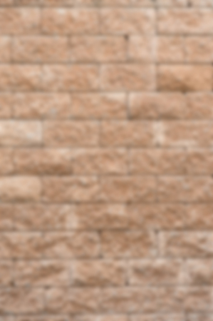 Laterite stone wall background blurの写真素材