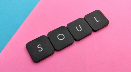 SOUL word in black letters on pink and blue background.の写真素材