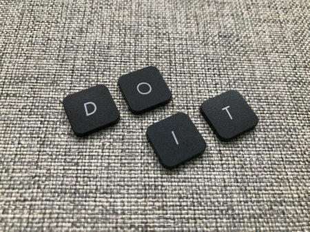 Do it text on grey carpet. Motivational and inspirational background.の写真素材