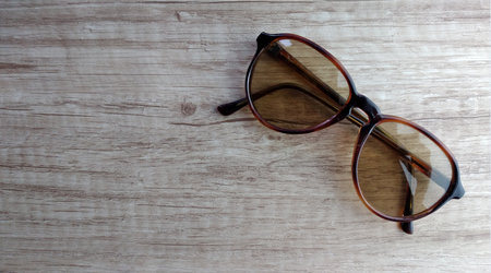 Sunglasses on a wooden background. Selective focus. nature.の写真素材