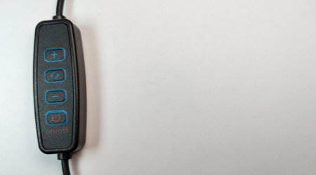 Close up of a car key on a white background with copy space