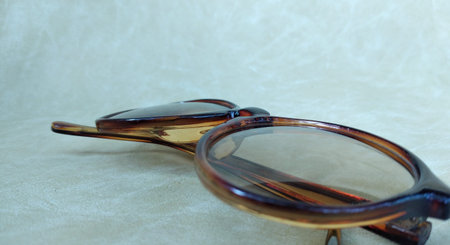 eyeglasses on a white background. tinting. selective focus