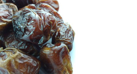 Dates fruit on white background. Selective focus. Food.