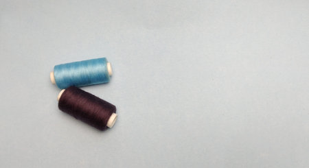 Spools of thread on a white background. Sewing accessories.