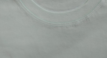 close-up of a white t-shirt with stitching at the neck