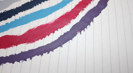 Colored strips of paper on a background of a white sheet of paper