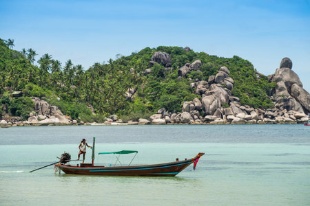 JULY 17, 2016 - TAO ISLAND, THAILAND Fisherman on the boatのeditorial素材