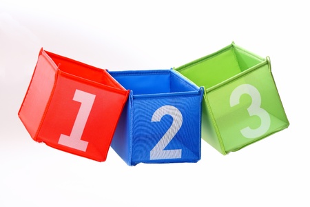 Multicolored containers with numbers isolated on whiteの写真素材