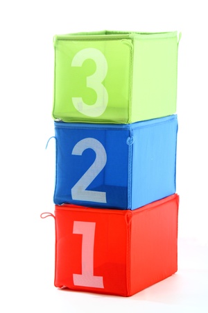 Multicolored containers with numbers isolated on whiteの写真素材