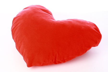Close-up of red Valentine's heart isolated on whiteの写真素材