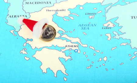 European New Year gift to Greece: euro coin in Santa