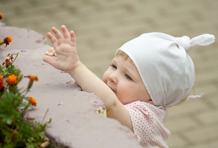 The baby girl gone for a walk in the parkの写真素材