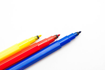 Three markers of primary colours; white backgroundの写真素材