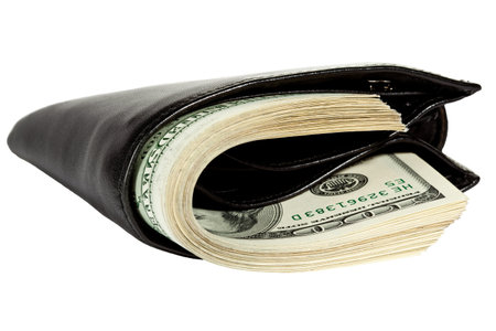 Bundle of dollars in leather wallet isolated on white