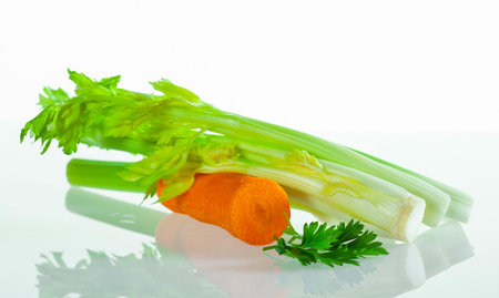 Healthy snack of carrot, celery and parsleyの写真素材