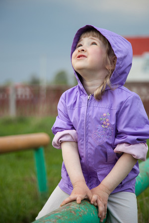 Active little girl playing outdoorsの写真素材