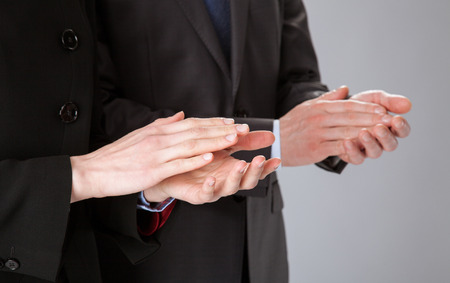 Business people applauding - closeup shotの写真素材
