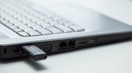 Laptop and removable usb memory - closeup shot