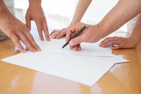 Closeup of business people hands during teamwork - closeup shot