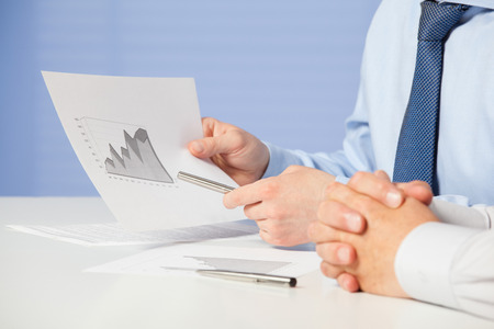 Businessmen discussing business outlook, closeup shotの写真素材