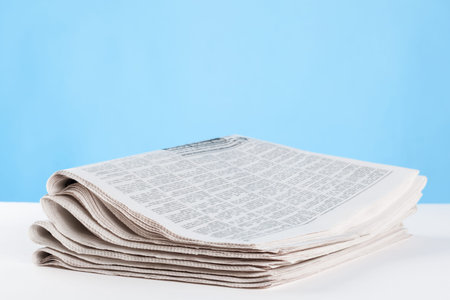 Free newspaper on the table, closeup shot