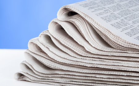 Free newspaper on the table, closeup shot