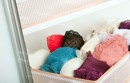 Feminine lacy underwear in a wardrobeの写真素材