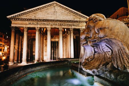 Picturesque photo of Pantheon at night with the elements of the fountain in the foreground, Rome, Italyの写真素材