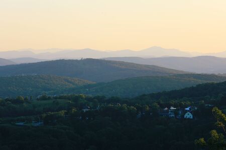 Beautiful sunset with the view of the skyline over the hills around Vienna, Austriaの写真素材