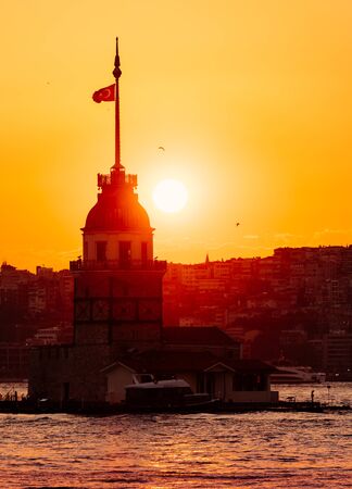 The silhoette of the Maiden's tower on the Asian side of Istanbul during sunsetの写真素材