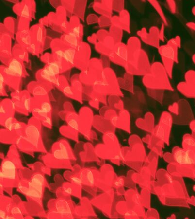 Fantasy abstract picture with red blurred heartsの写真素材