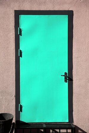 Door in aqua menthe colorの写真素材